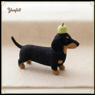 Dachshund with Green Apple on Head – Wool Felt Balancing Desk Pet
