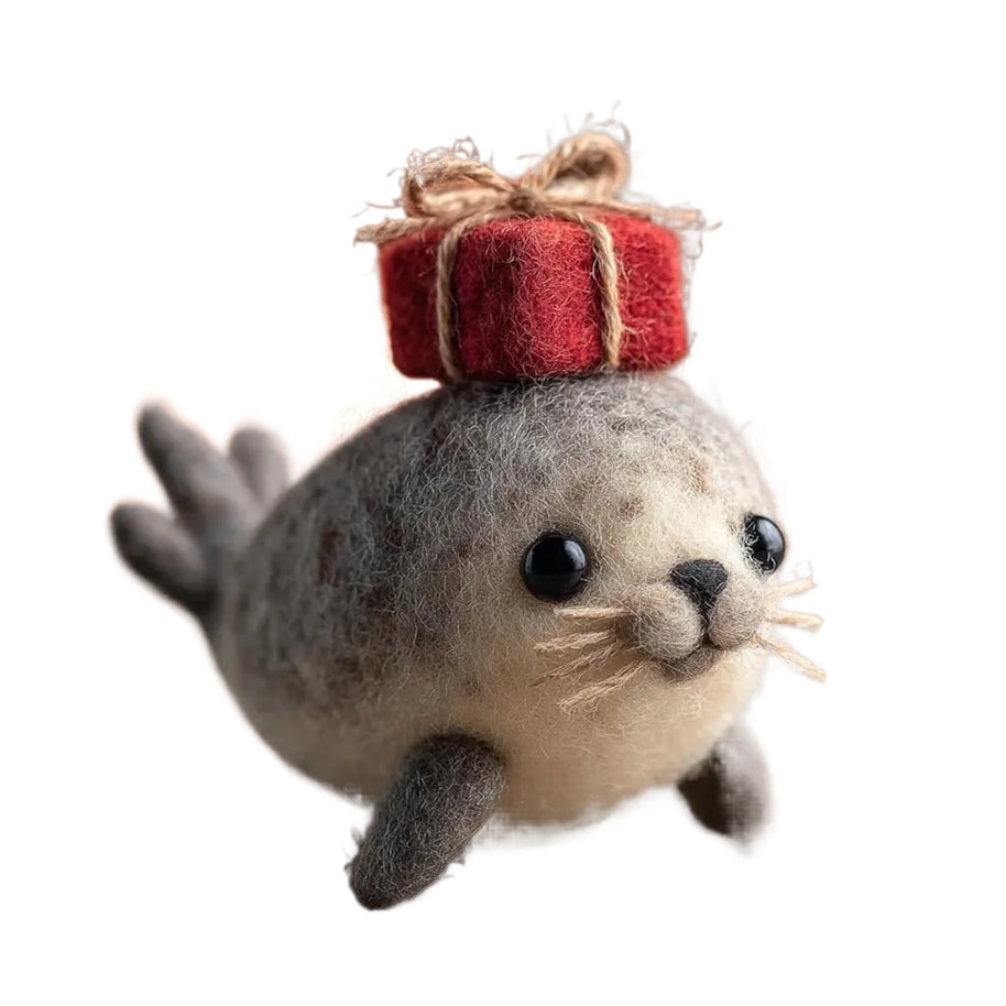 Gift‑Bearer Seal – Wool Felt Figurine with Present on Head
