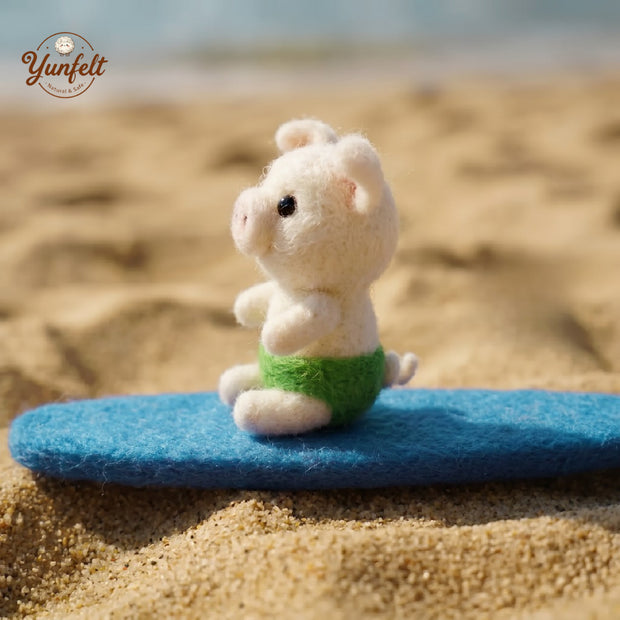 Pig in Swimsuit on Surfboard – Carefree Wool Felt Summer Figurine