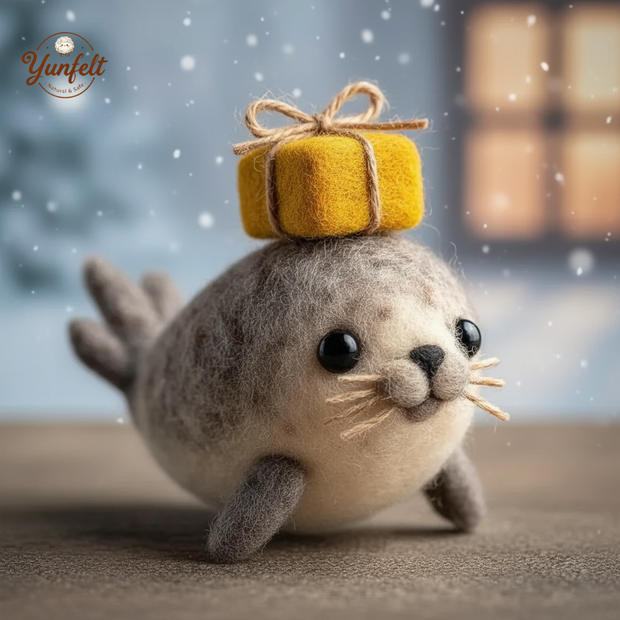 Gift‑Bearer Seal – Wool Felt Figurine with Present on Head